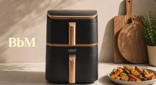Cosori Turbo Tower Pro noir et cuivre avec légumes rôtis dans une cuisine familiale